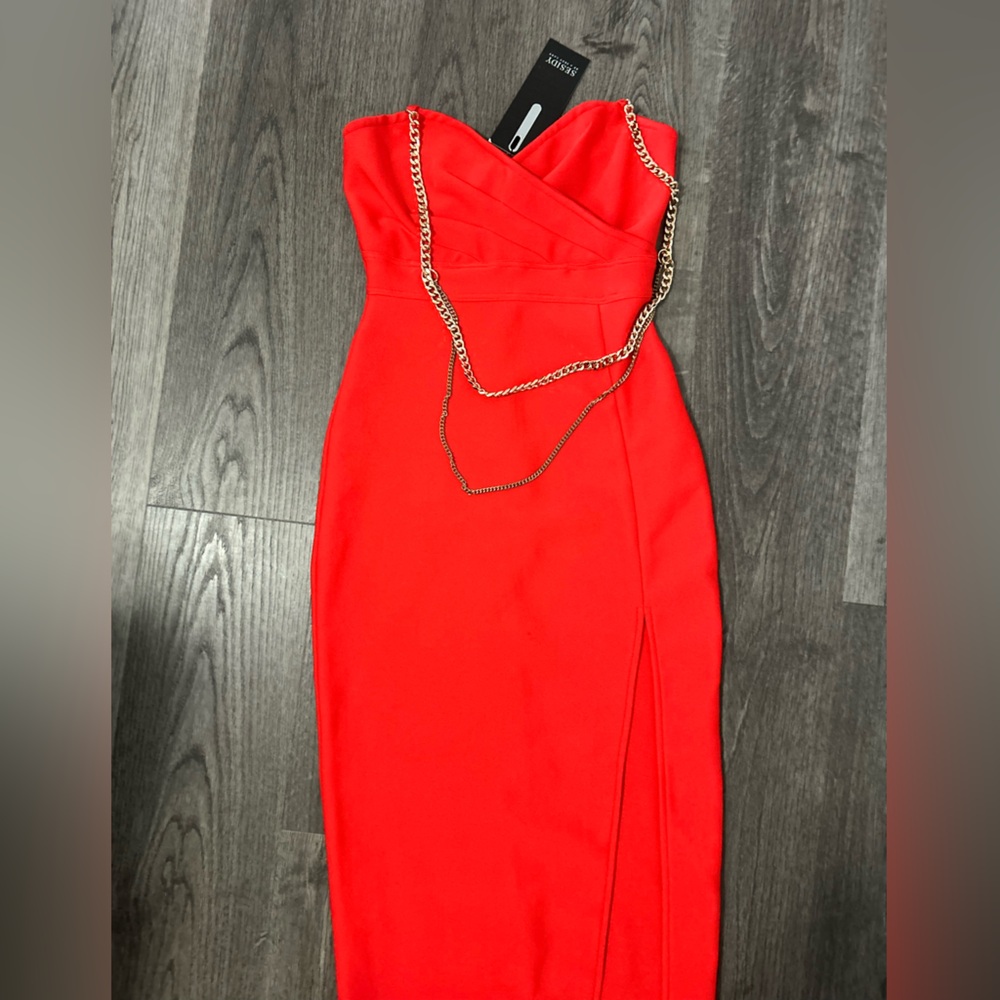 Elegant Red Skirt with Chain Detail